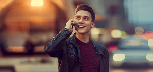 young male with mobile phone